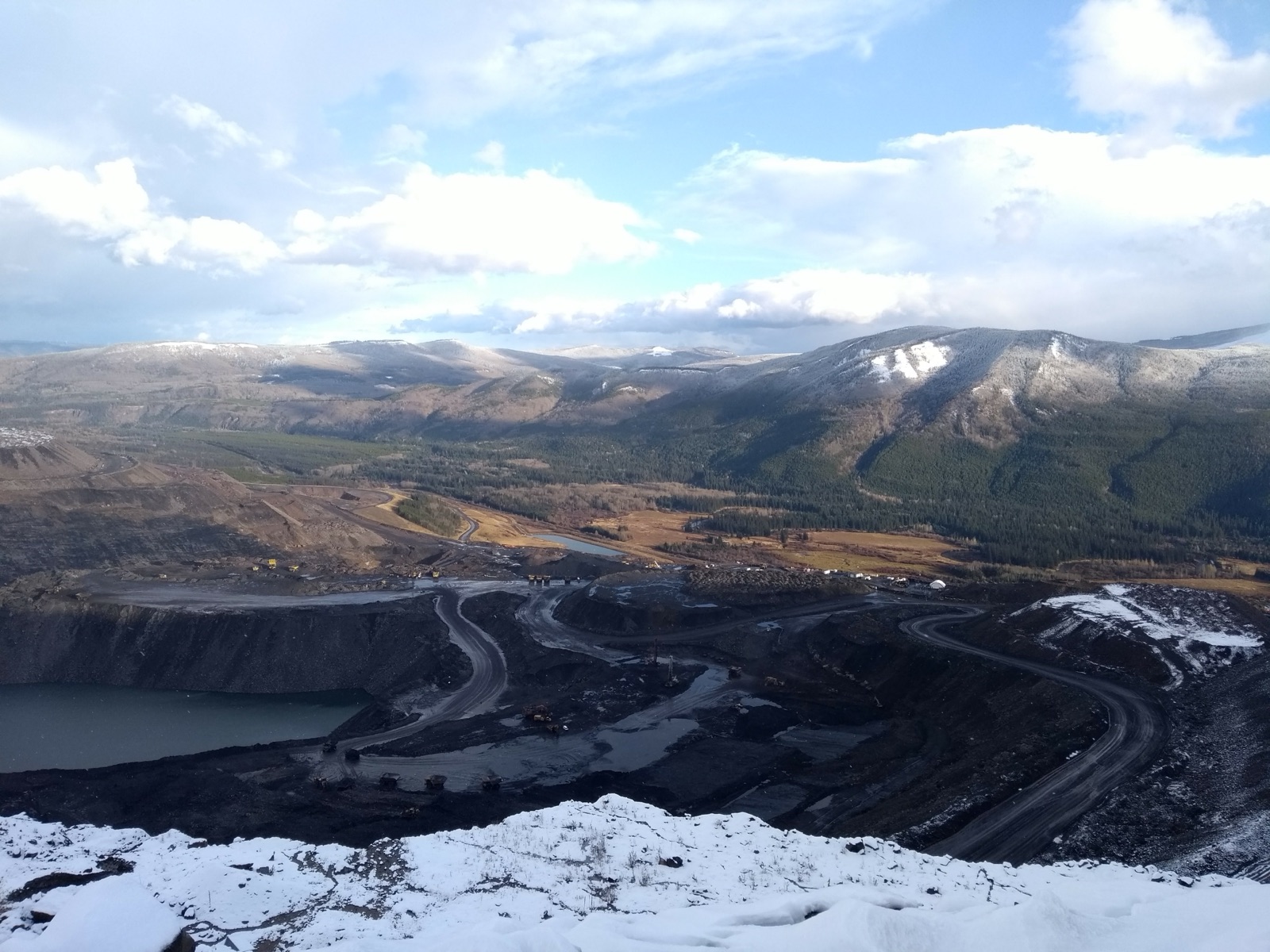 Mountain mine roads winding through alpine terrain