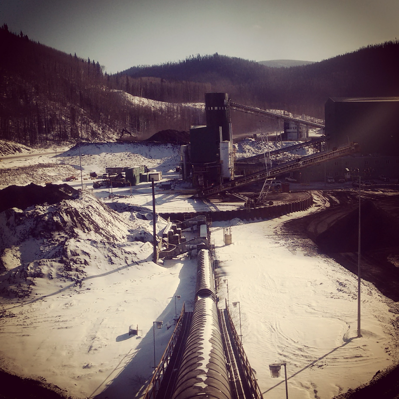 Winter processing plant in a mountain valley